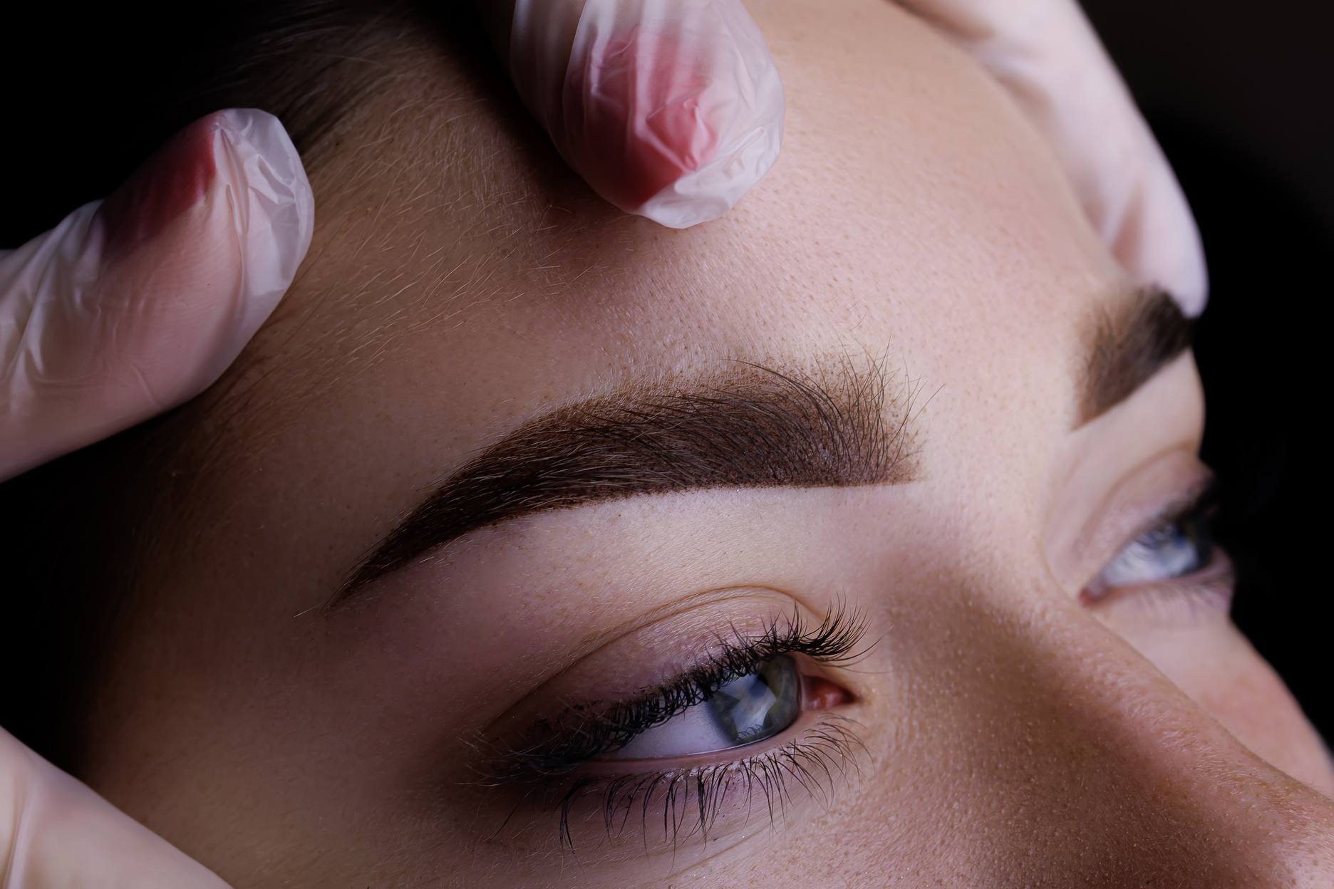 Eyebrow permanent makeup, closeup eyebrow tattoo result after pr